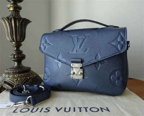 louis vuitton navy nacre|louis vuitton monogram handbags.